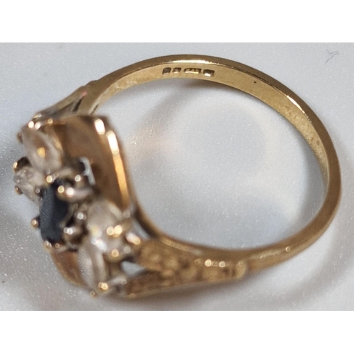 319 - 9ct gold dress ring, the blue and clear stones formed as an insect. 2.7g approx. Size M1/2. (B.P. 21... 