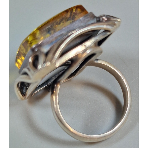 321 - Silver and Baltic amber dress ring. 12.5g approx. Size M. (B.P. 21% + VAT)