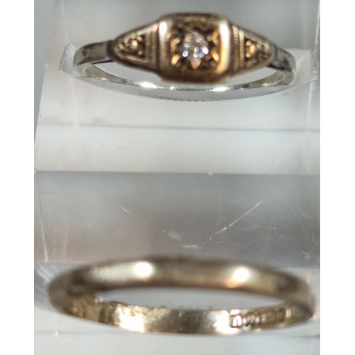 327 - 9ct gold wedding band. 1.1g approx. Together with a gold indistinctly marked ring inset with a tiny ... 