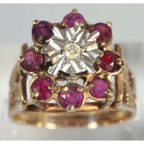 328 - 9ct gold ruby and diamond flowerhead cluster ring. 4.7g approx. Size O. (B.P. 21% + VAT)