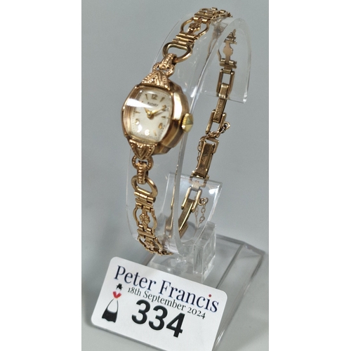 334 - Rotary 9ct gold ladies' bracelet cocktail watch, having Baton and Arabic numerals on fancy pierced g... 