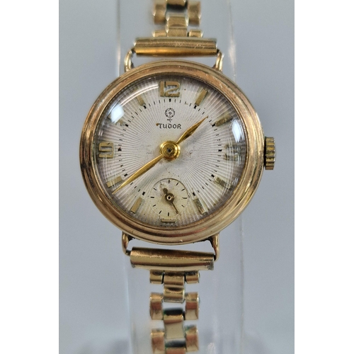 345 - Lady's 9ct gold Tudor small head cocktail watch with satin face, Baton numerals and seconds dial on ... 