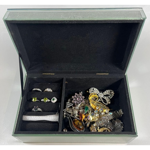 349 - Modern silvered and glass jewellery box comprising assorted jewellery to include: various dress ring... 