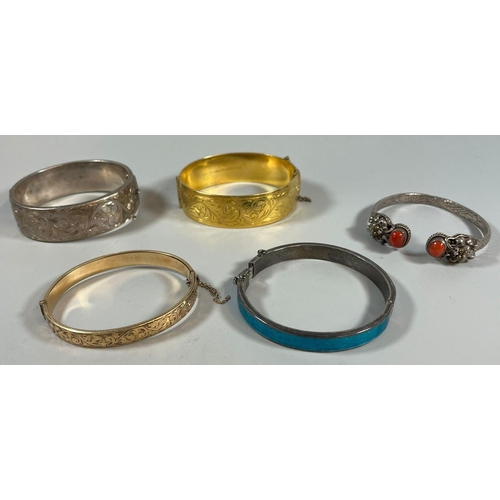 349A - Collection of rolled gold and silver and other bangles, one with blue enamel. (5) (B.P. 21% + VAT)