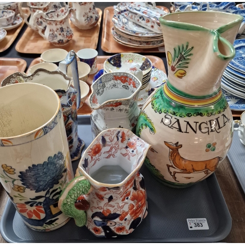 383 - Tray of ceramics to include: faïence single handled jug marked Sangria, pouch shaped dresser jugs, A... 