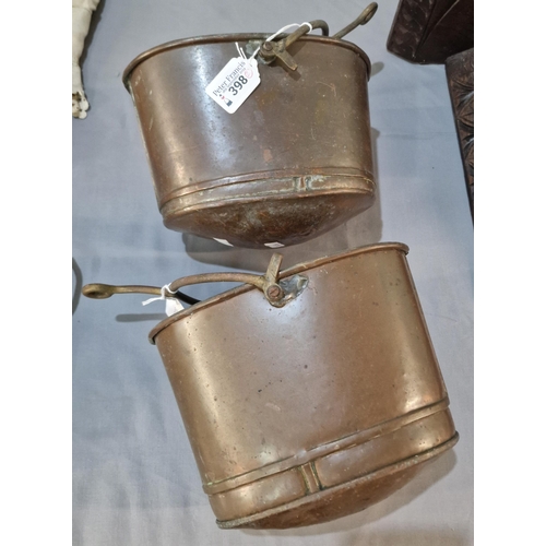 398 - Pair of copper buckets with iron swing handles. (2)(B.P. 21% + VAT)