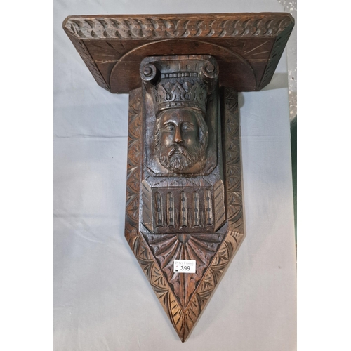 399 - Carved oak Flemish design wall bracket with a king's head. 50cm long approx. (B.P. 21% + VAT)