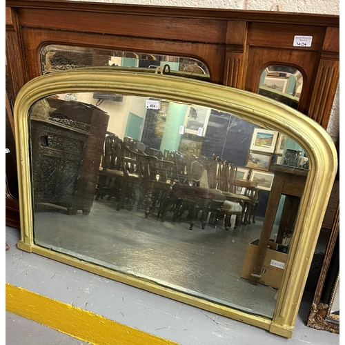 404 - Three over mantle mirrors, two with wooden frames and beveled plates, a further with arched gilt fra... 