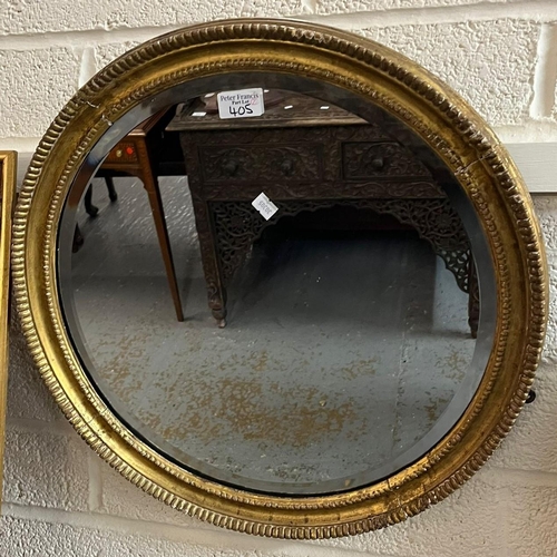 405 - Two gilt framed mirrors, one circular with beveled plate, overall 50cm diameter approx. The other ov... 