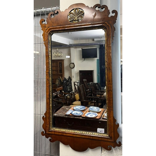 407 - Pair of 18th century style walnut framed fret cut pier glasses, with pierced and gilded crestings an... 