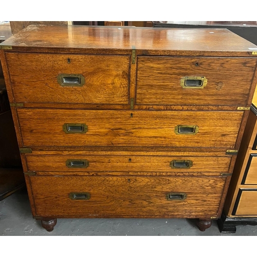 445 - Victorian teak military Campaign Chest, having brass corners, bands and recessed handles, in two sec... 