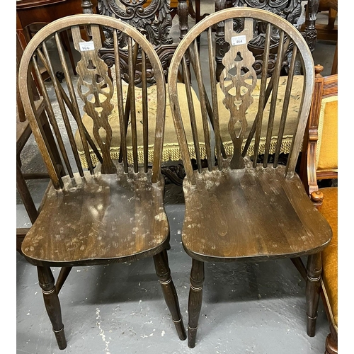 464 - Pair of stained beech wheel backed kitchen chairs. (2) (B.P. 21% + VAT)