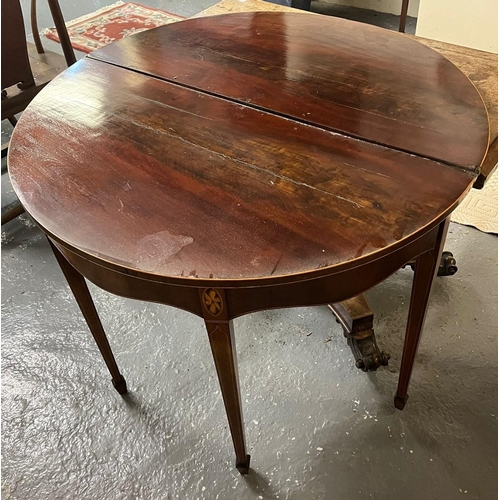 489 - 18th century demilune fold over card table on four gate action legs, with satinwood strung outline. ... 