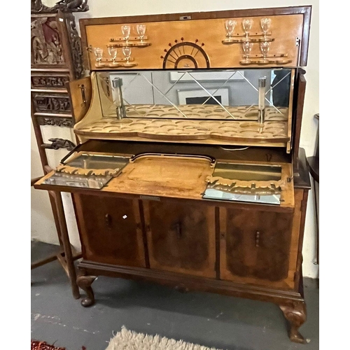 510 - Mid century walnut metamorphic drinks cabinet with mirrored fitted interior revealed behind fall fro... 