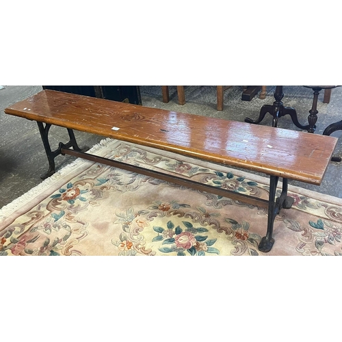 519 - Pitch pine bench with cast iron supports marked Fisher & Son ,West Bromwich. 177cm wide approx. (B.P... 