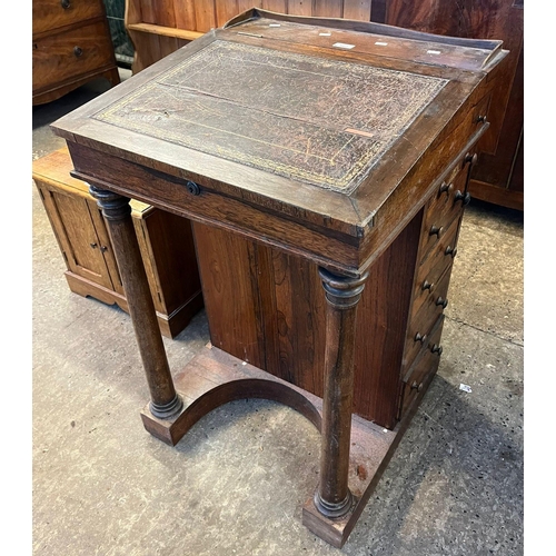 562 - 19th century rosewood Davenport writing desk, having leather writing surface, fitted drawers to the ... 