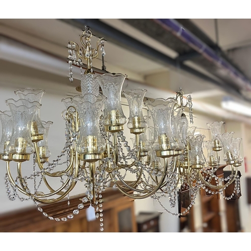 564 - Pair of modern brass and glass chandeliers. (B.P. 21% + VAT)