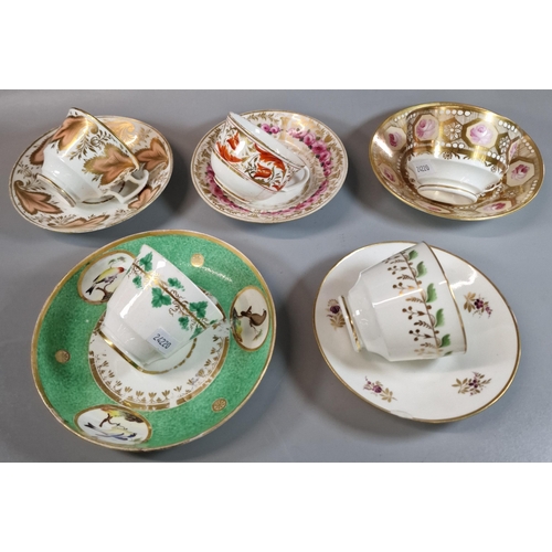 96 - Collection of 19th century Swansea porcelain cups and saucers, varying designs including: green leav... 