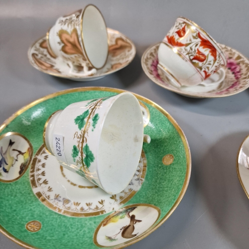 96 - Collection of 19th century Swansea porcelain cups and saucers, varying designs including: green leav... 