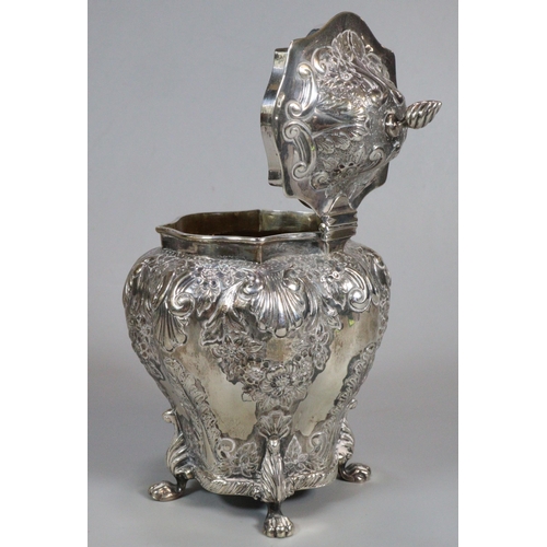 182 - Late Victorian silver repoussé tea caddy on four paw feet. Chester 1896. Maker's mark initial R H. 8... 