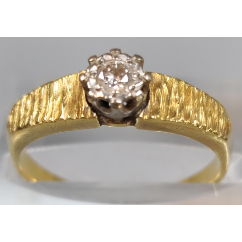 193 - 18ct gold diamond solitaire ring with bark design shoulders. 4.1g approx. Size M1/2. (B.P. 21% + VAT... 