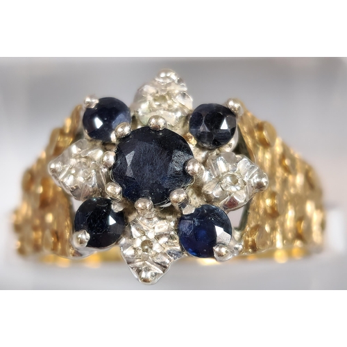 194 - 9ct gold blue and clear stone cluster ring. 4.2g approx. Size L. (B.P. 21% + VAT)