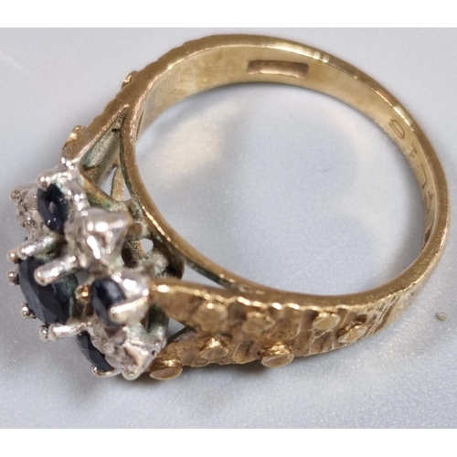 194 - 9ct gold blue and clear stone cluster ring. 4.2g approx. Size L. (B.P. 21% + VAT)