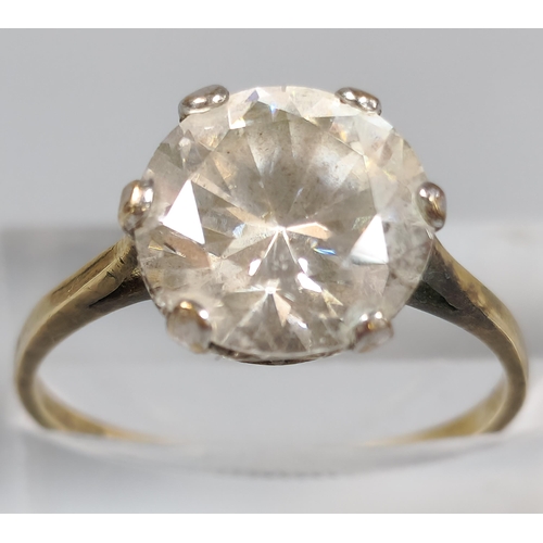 201 - 9ct gold clear stone solitaire design ring. 3g approx. Size O. (B.P. 21% + VAT)