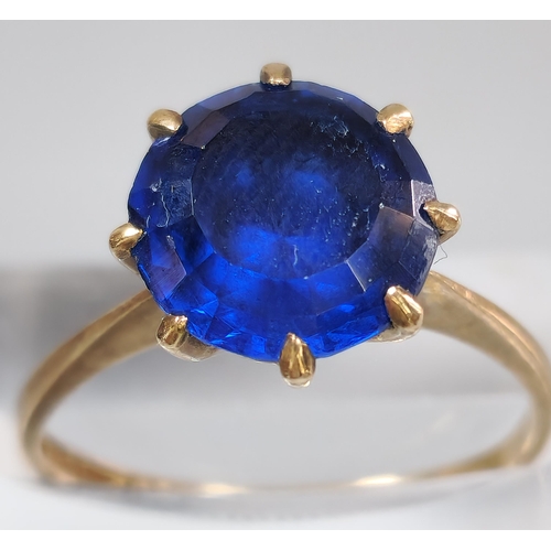 202 - 9ct gold blue stone dress ring. 2.7g approx. Size N1/2. (B.P. 21% + VAT)