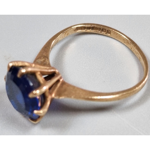 202 - 9ct gold blue stone dress ring. 2.7g approx. Size N1/2. (B.P. 21% + VAT)