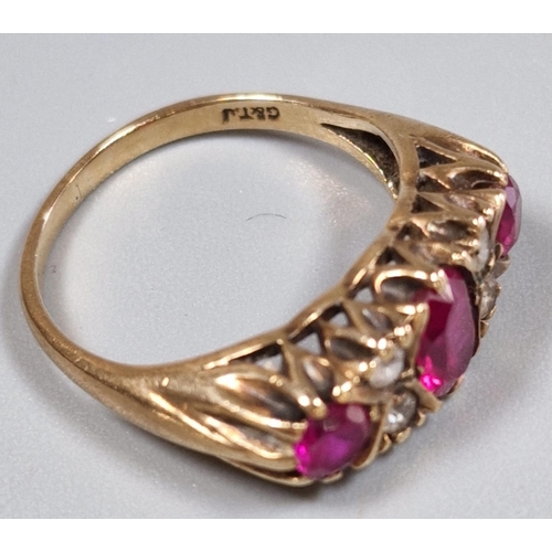 204 - 9ct gold red and clear stone dress ring. 3.4g approx. Size P. (B.P. 21% + VAT)