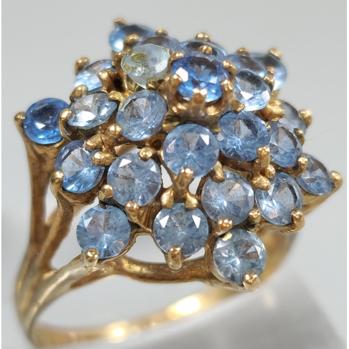 206 - 9ct gold multi cluster blue stone dress ring. 4.7g approx. Size M. (B.P. 21% + VAT)