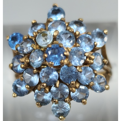 206 - 9ct gold multi cluster blue stone dress ring. 4.7g approx. Size M. (B.P. 21% + VAT)