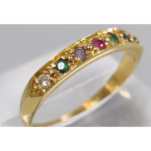 207 - 18ct gold channel set multi stone ring set with diamond, emerald, ruby and sapphire. 2.6g approx. Si... 