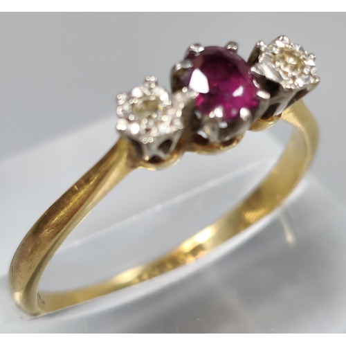 210 - 18ct gold and platinum diamond and ruby three stone ring. 3g approx. Size Q. (B.P. 21% + VAT)