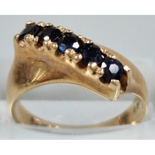 212 - 9ct gold modernist design blue five stone dress ring. 3.5g approx. Size L1/2. (B.P. 21% + VAT)