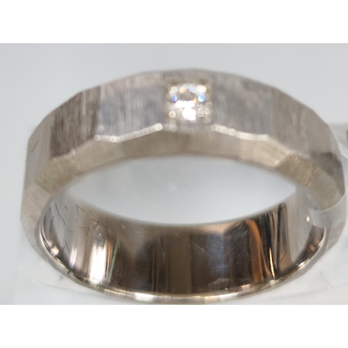 216 - Palladium 950 and diamond wedding band. 5.9g approx. Size L. In fitted box. (B.P. 21% + VAT)