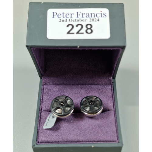 228 - Pair of stainless steel Spin car Wheel cufflinks. In fitted 'Wave' box. (B.P. 21% + VAT)