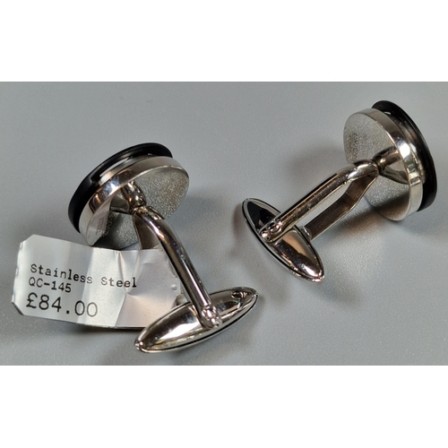 228 - Pair of stainless steel Spin car Wheel cufflinks. In fitted 'Wave' box. (B.P. 21% + VAT)