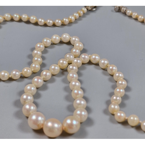 233 - Cultured pearl graduated necklace with 9ct gold clasp. 50cm long approx. (B.P. 21% + VAT)