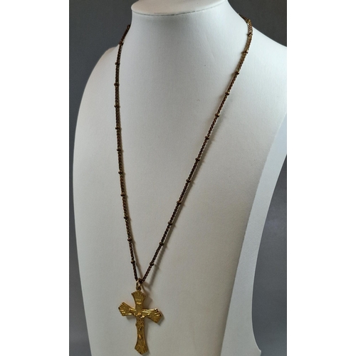 234 - Sterling silver gilded crucifix pendant on chain (not silver). (B.P. 21% + VAT)