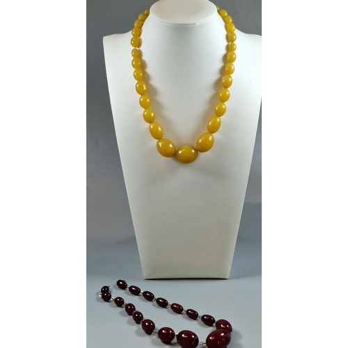 235 - Two graduated cherry and yellow beaded necklaces. (B.P. 21% + VAT)