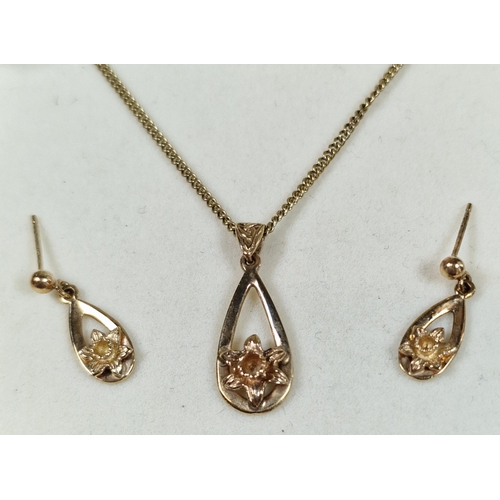 238 - 9ct Clogau gold daffodil pendant and earrings.  6.5g approx. (B.P. 21% + VAT)