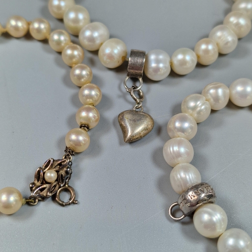 239 - Collection of pearl and faux pearl bracelets, one marked Thomas Sabo Charm Club with silver clasp, t... 