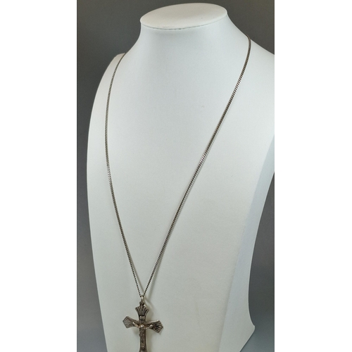 240 - Gilt sterling silver crucifix pendant on curb link chain marked 'Bjorg'. (B.P. 21% + VAT)