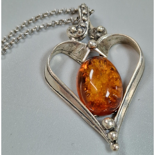 241 - Silver chain with amber and heart shaped silver pendant. (B.P. 21% + VAT)