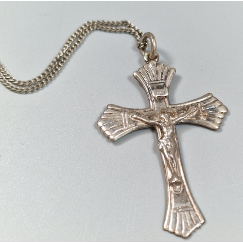 244 - Sterling silver crucifix pendant on silver chain.  (B.P. 21% + VAT)