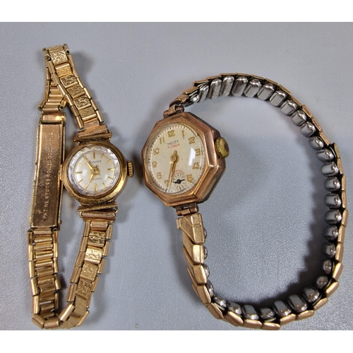 256 - Two 9ct gold ladies' wristwatches, one marked Accurist, the other Majex. Both with gold plated strap... 