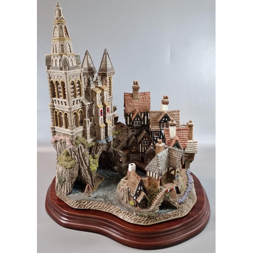 27 - Three large David Winter architectural models of 'Haunted House', 'Quindene Manor' and another on wo... 