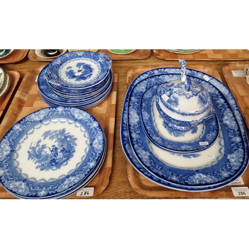 286 - Two trays of Doulton Burslem blue and white transfer printed dinner ware items in the 'Watteau' patt... 